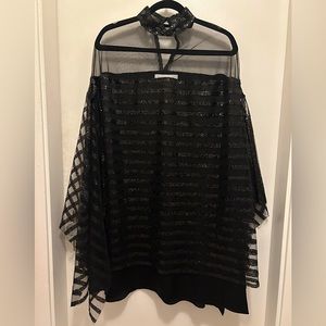 Black, sequinned Nino Lettieri cape style dress.